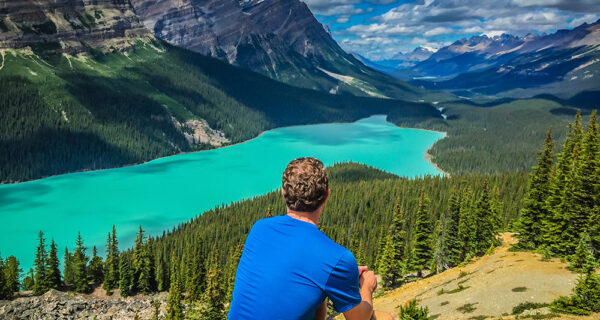Self-portrait taken on a road-trip through Canada. This is Peyto Lake in Banff National Park - Alberta, Canada. Lifestyle Blogger. Lifestyle Influencer. Lifestyle Photography.
