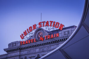 City photograph of Union Station in Denver, Colorado at dusk.